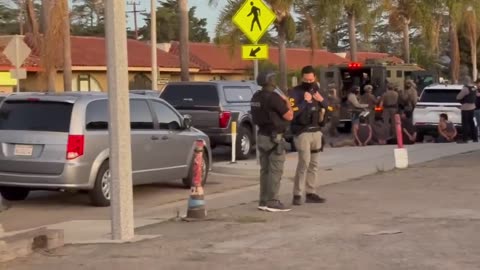Major raid happening in Oxnard, California. Several illegal aliens are zip tied with