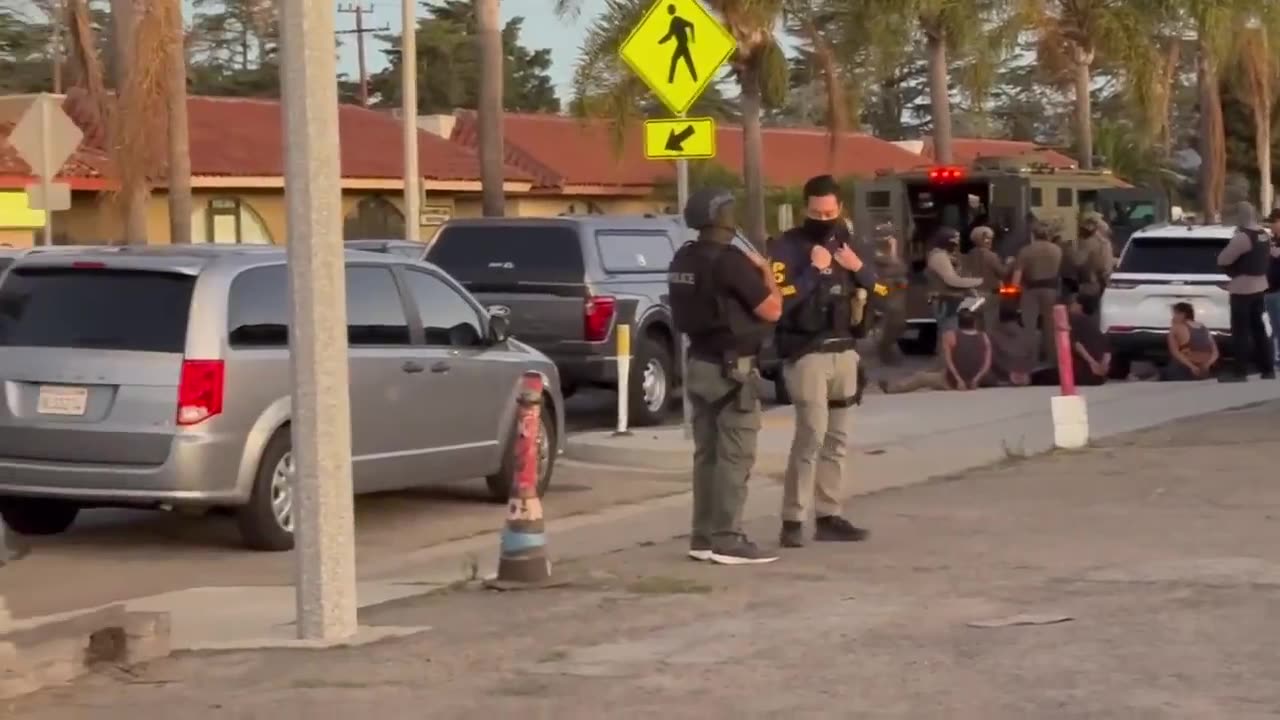 Major raid happening in Oxnard, California. Several illegal aliens are zip tied with