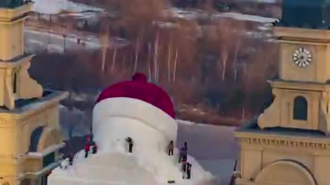 A timelapse of the 10-day construction of a giant snowman unveiled in China