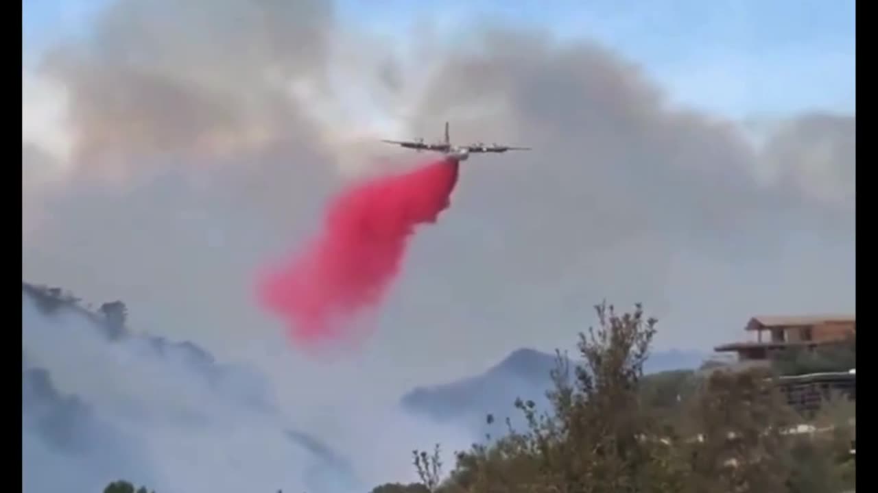 Tanker drops over the Palisades fire in Los Angeles