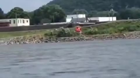 Supposedly spraying the water for public safety...no markings. No tail numbers.