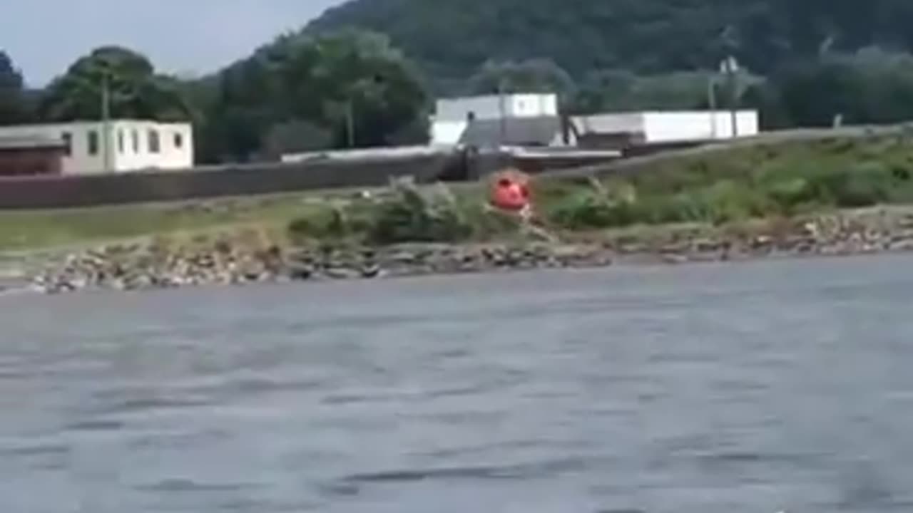 Supposedly spraying the water for public safety...no markings. No tail numbers.