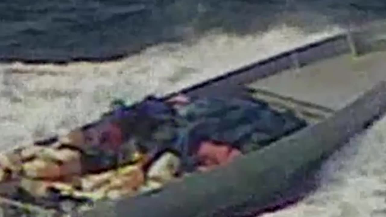 What a Shot! Sniper Takes Out Drug Boat's Motor Firing from a Helicopter