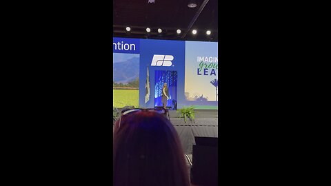 Elaine singing the national anthem at the 2025/2026 Farm bureau convention