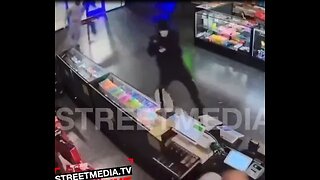 Store clerk shoots armed robbers in self defense, watch them run