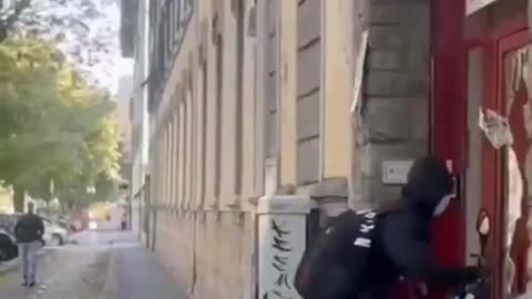An asylum seeker in Italy wants a new motorbike so he tries to steal it in broad daylight.