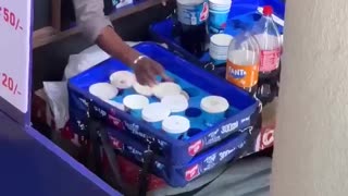 Vender recycles leftover soda from customer cups at 2026 World Cup