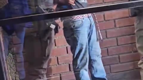 DHS agents detain an illegal alien in Indiana Harbor, East Chicago.