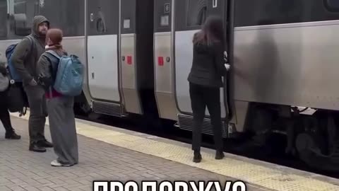 🚂🚆 An old diesel locomotive pulls a modern high-speed train.