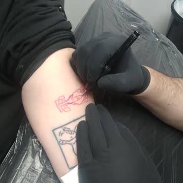 Hailey getting Tattoo fixed