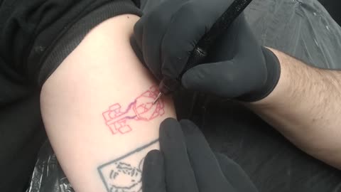 Hailey getting Tattoo fixed