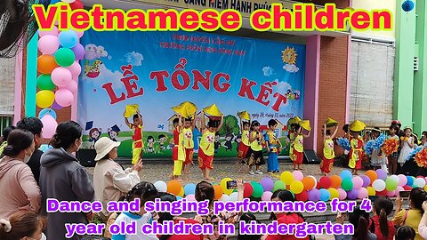 Group of 4-year-old children dancing and singing in kindergarten