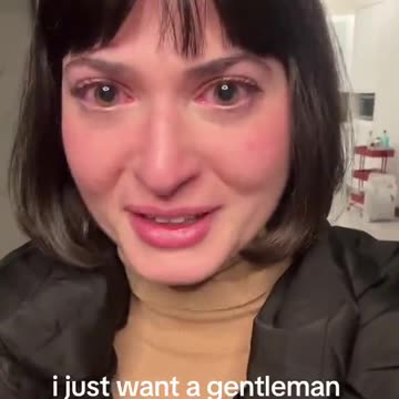 Woman breaks down in tears and films herself after a man split the bill on their date.