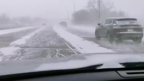 Commuting to work in Minnesota Snow Storm