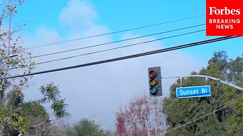 Smoke From Wildfires Across Los Angeles Seen In The Sky Above Sunset Boulevard