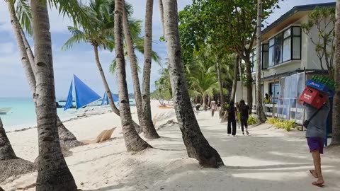 Having Fun on a Summer Beach at Noon at 12:00 in October 2025
