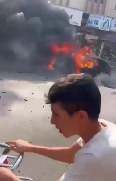 An Israeli drone strike hits a vehicle in the village of Dweir in southern Lebanon