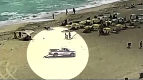 The moment Miami Beach lifeguards drive a F-350 over a 59-year-old man sunbathing
