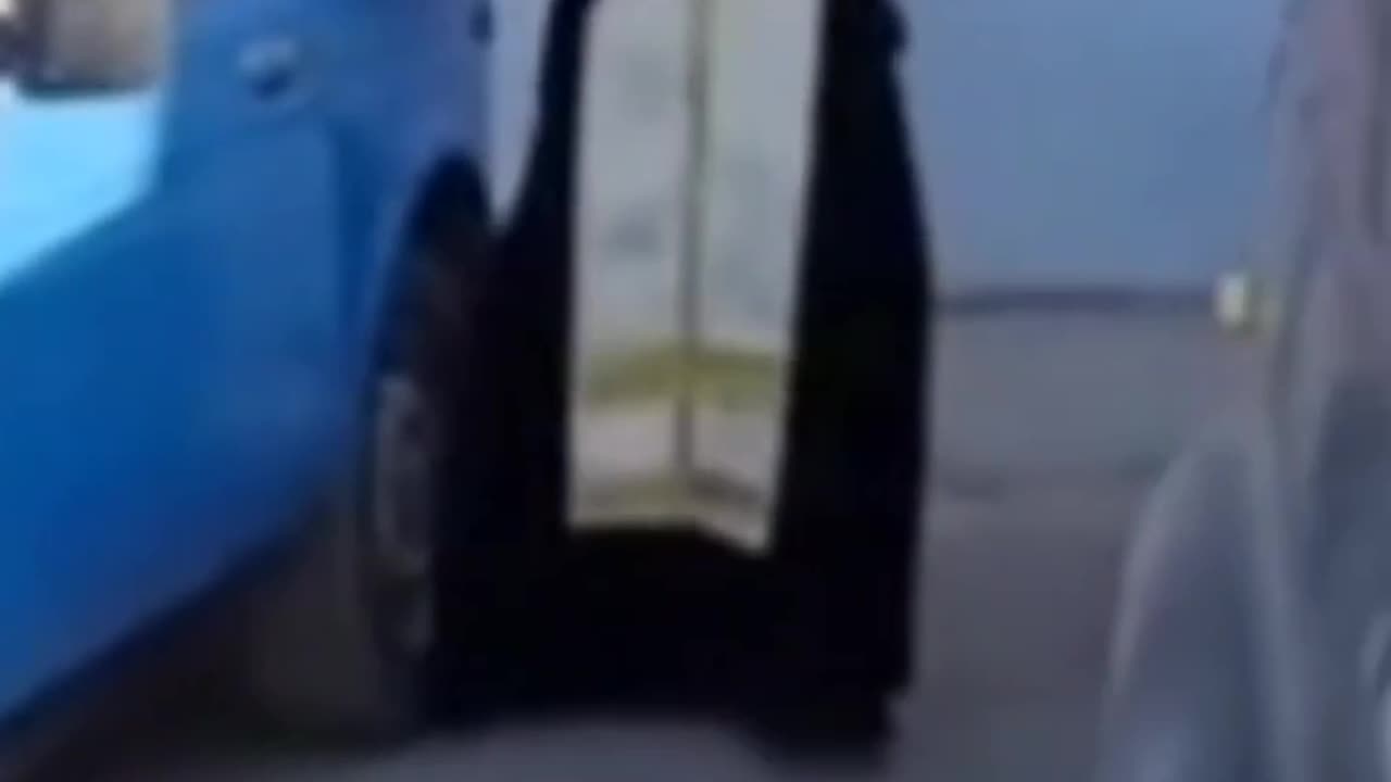 Russian Priest Windexes Holy Water Into Used Vehicles to Protect Russian Soldiers