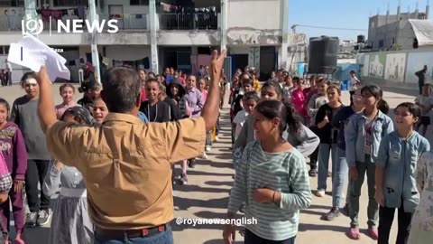 Gaza’s students return to classes in school sheltering displaced
