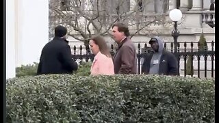 Tucker Carlson seen entering the White House