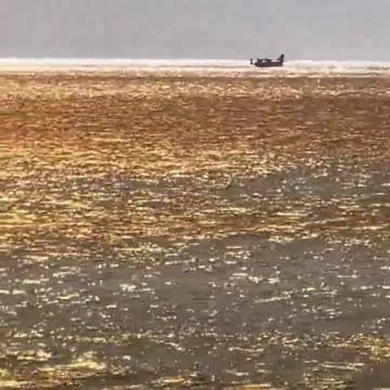 Sea Plane refills water in the ocean to combat the Palisades fire.