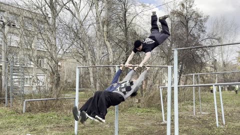 Three Person "Helicopter" on Horizontal Bar
