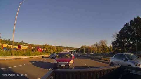 Aggressive driver nearly causes collision, twice.