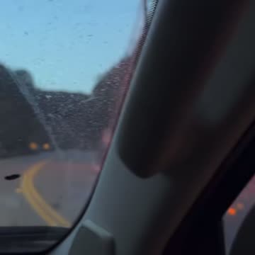 A man videos himself driving by the Los Angeles palisades fire