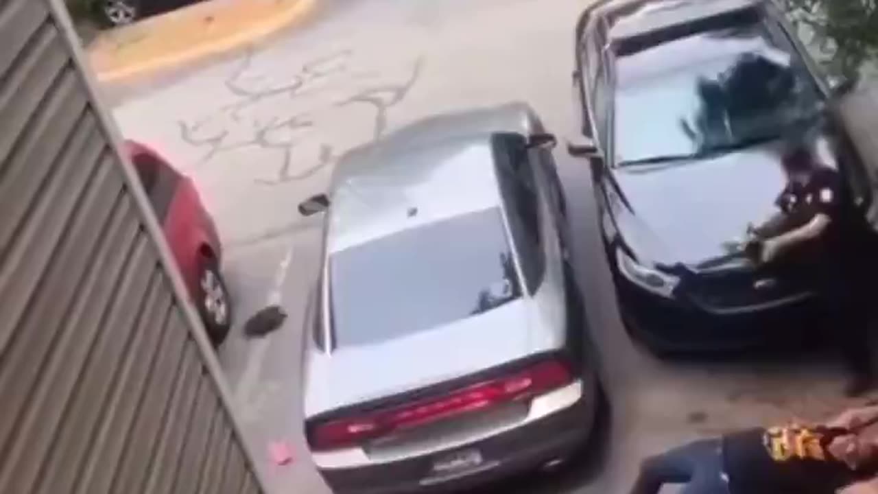 Female cop almost gets crushed by her own car🤦‍♂️