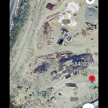 LATC Union Pacific SPACR/9093 Rail Yard HELP SPELLED OUT ON SATELLITE IN RAIL YARD