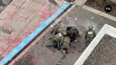 Federal police make several arrests outside the ICE facility in Portland.