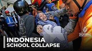 Indonesia school collapse: At least 13 dead and dozens remain trapped