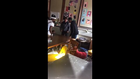 Stands for his teacher - not a boy, a man
