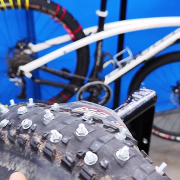 Screw studs into tires for winter cycling