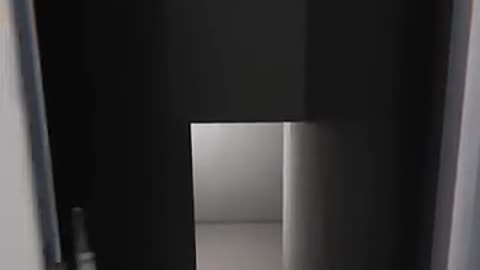 A Ghost attacks from the stairs.