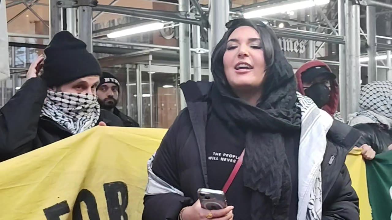 "FLOOD NEW YORK CITY FOR GAZA" in front of The New York Times.