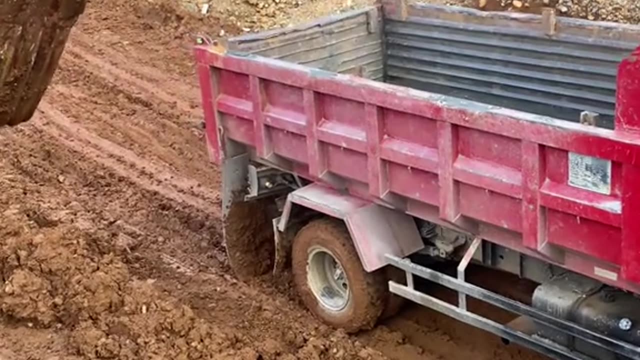 queues of trucks passing through steep roads on top of mountains