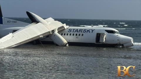 Passenger plane in Somalia overshoots the runway into shallow seawater near the airport