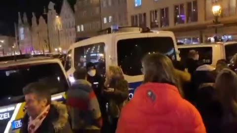Augsburg, Germany last night Protesters for freedom chant "Wir wollen laufen!!!" as police tries to block the protest.