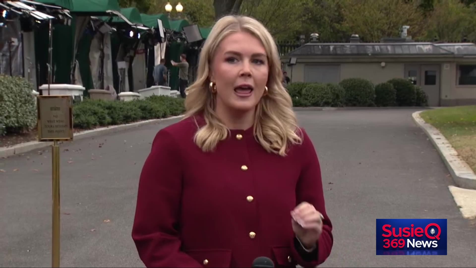Press Secretary Speaks with Reporters in White House Driveway