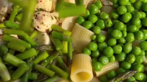 Lemon, basil and ricotta pasta salad with mozzarella, peas, asparagus and parmigiano reggiano