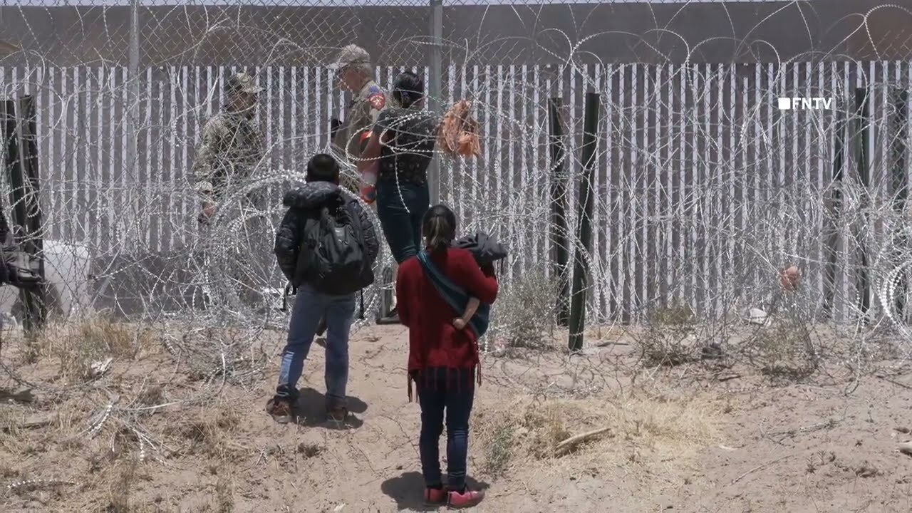 Migrant Family Stopped from Hopping Border Wall on Texas-Mexico Border