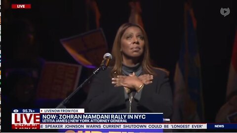 Letitia James raises her FIST to the air, in first public appearance since fraud indictment.