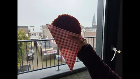 Trying one of The Netherlands Traditional Treats!