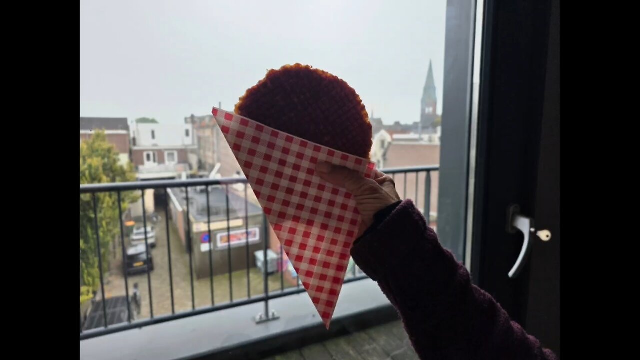 Trying one of The Netherlands Traditional Treats!