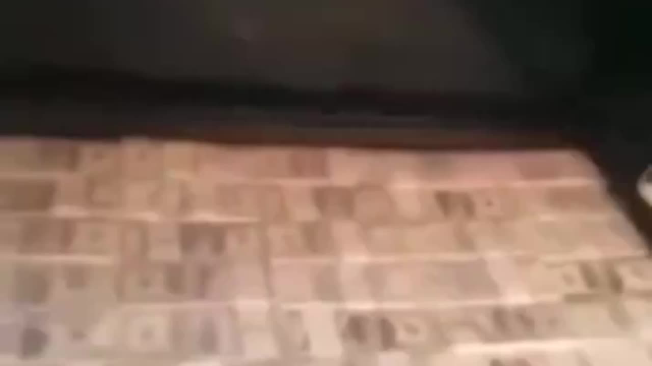 Red Cross with boxes of $100 bills