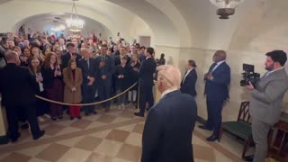 Trump stops by to say hello to a group touring the White House