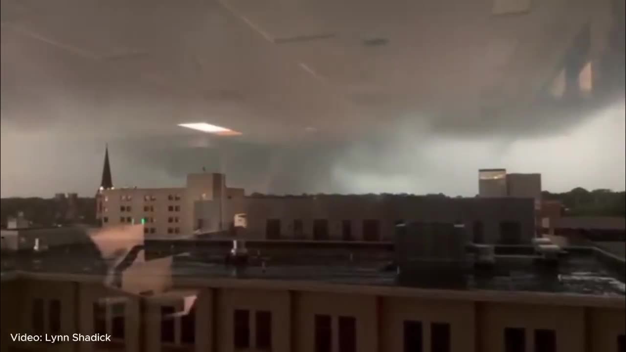 Power flashes as a large tornado moves through Appleton, Wisconsin
