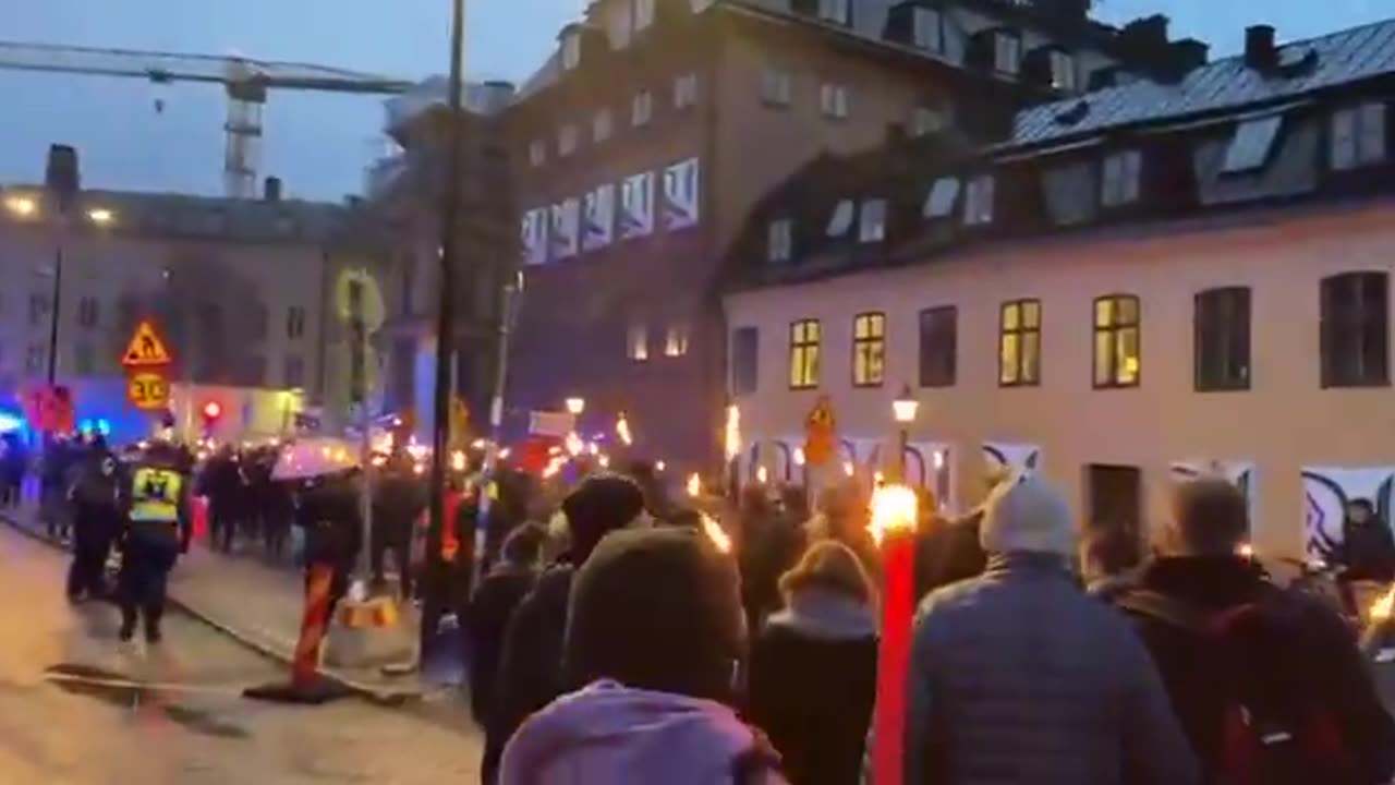 Swedish people marched in the street to protest against open borders yesterday